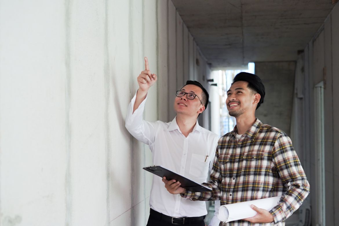 workers inspecting a house
