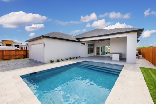 Pool and backyard design by Dolcan Homes